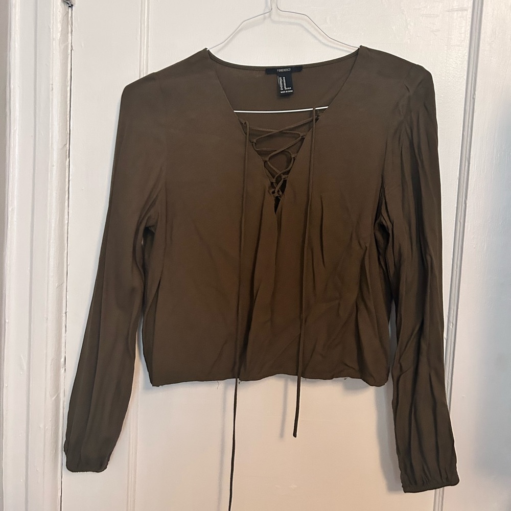 Green, long sleeve, cropped lace up shirt. Size medium